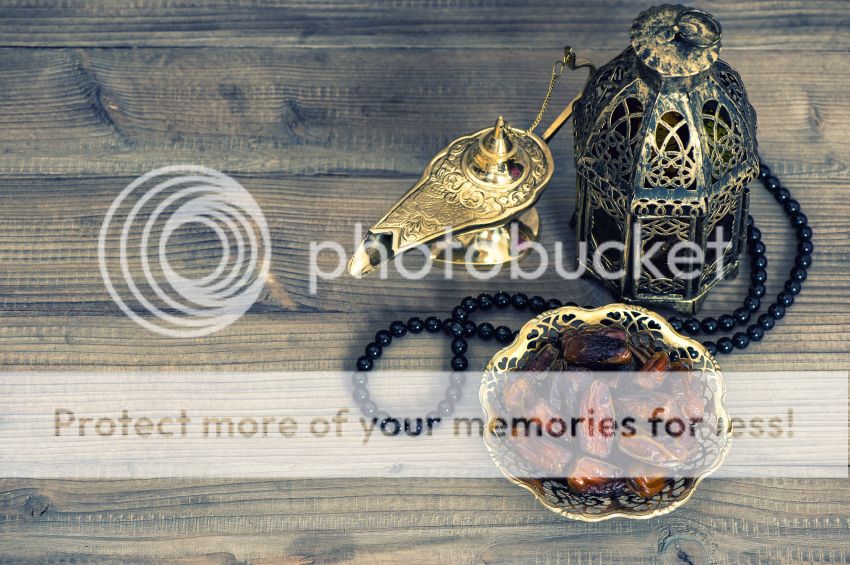 Dates arabian lantern and rosary. Islamic holidays concept