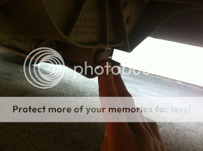 Where's the transfer case drain plug located on a 2003 Chevy Astro and GMC Safari Forum